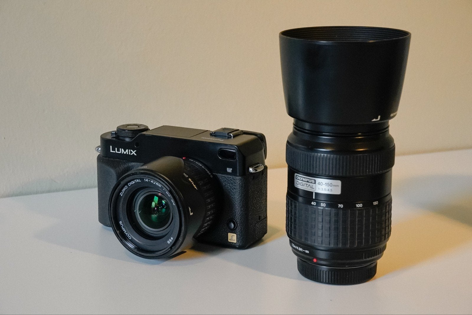 Panasonic Lumix L1 + 2 lenzen, Panasonic, Spiegelreflex, Ophalen of Verzenden, Zo goed als nieuw