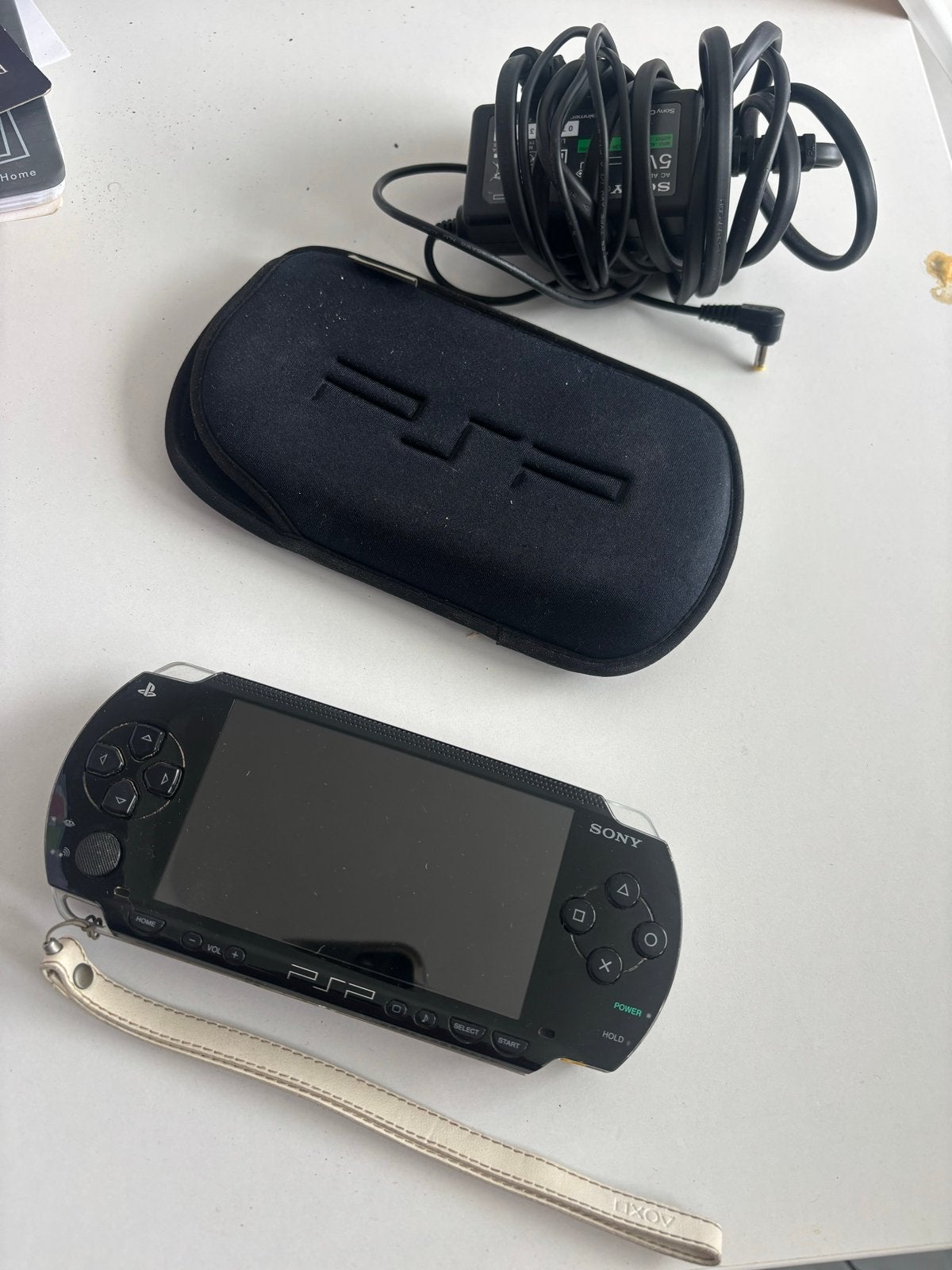 Sony PSP 1000 Zwart met hoesje en oplader, Spelcomputers en Games, Spelcomputers | Sony PSP, Ophalen of Verzenden, Gebruikt, Zwart