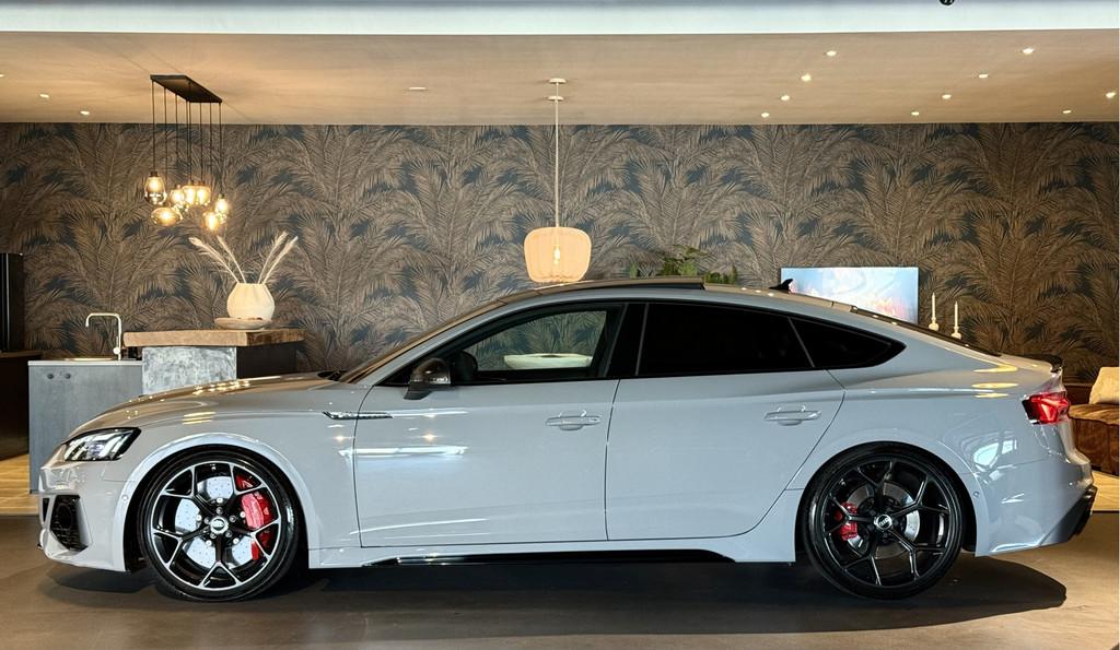 Audi RS5 Sportback Quattro Competition Plus Kuipstoelen, Auto's, Audi, Gebruikt, Overige kleuren, 451 pk, Verwarming stoelen achter