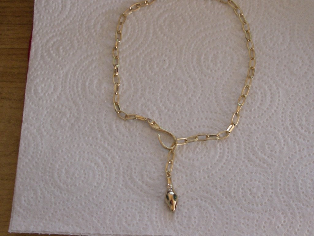Een Goud Vergulde Slang ketting met Groene Strass Ogen, Verzenden, Goud, Ketting, Verguld