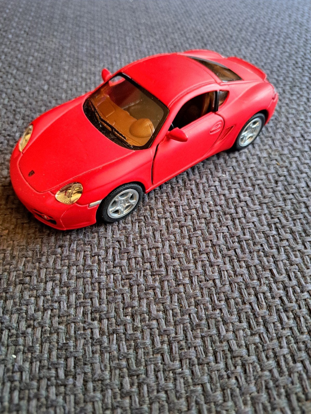 Kinsmart model porsche cayman s schaal 1:34, Gebruikt, Auto, Ophalen of Verzenden, N.b