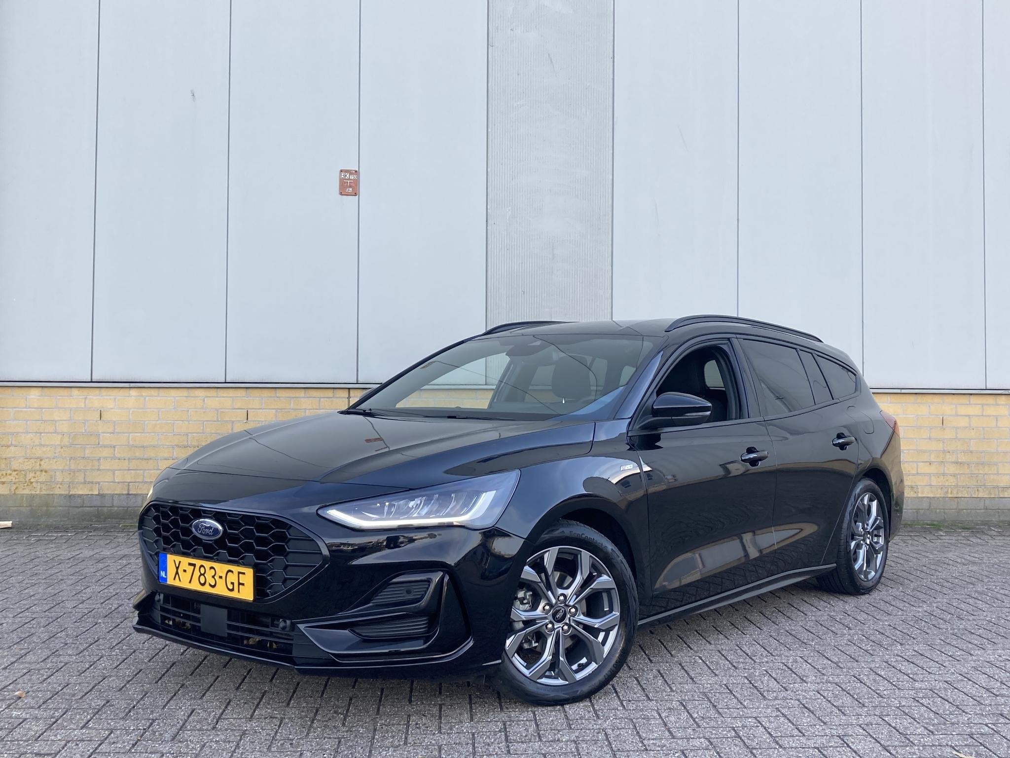 Ford Focus 1.0 EcoBoost Hybrid ST Line 125 pk Wagon GROOT NA, Auto's, Gebruikt, Zwart, Origineel Nederlands, Handgeschakeld