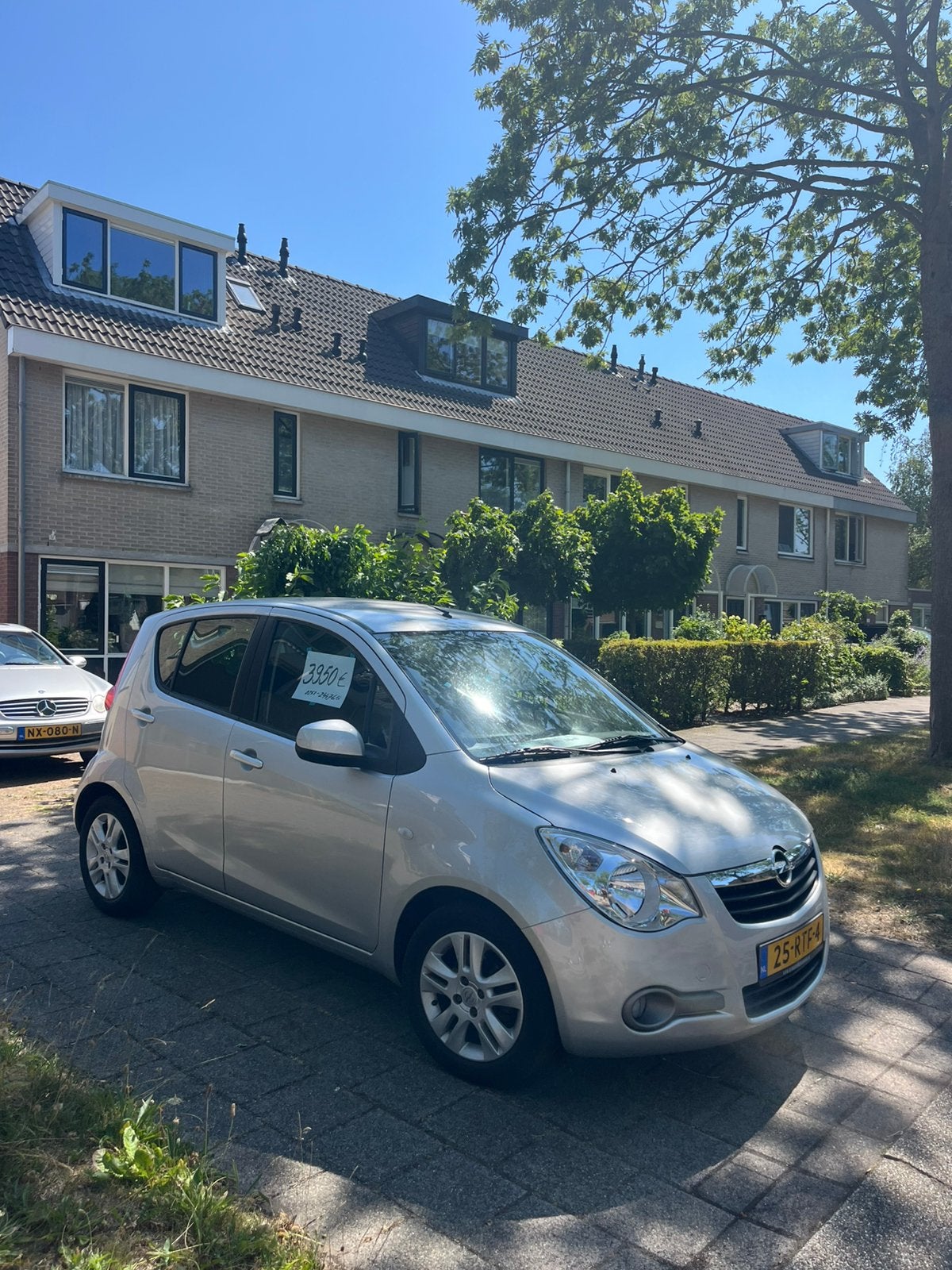 Opel Agila 1.2 16V 69KW 2011 Grijs, Auto's, Opel, Voorwielaandrijving, 40 €/maand, 4 cilinders, 965 kg
