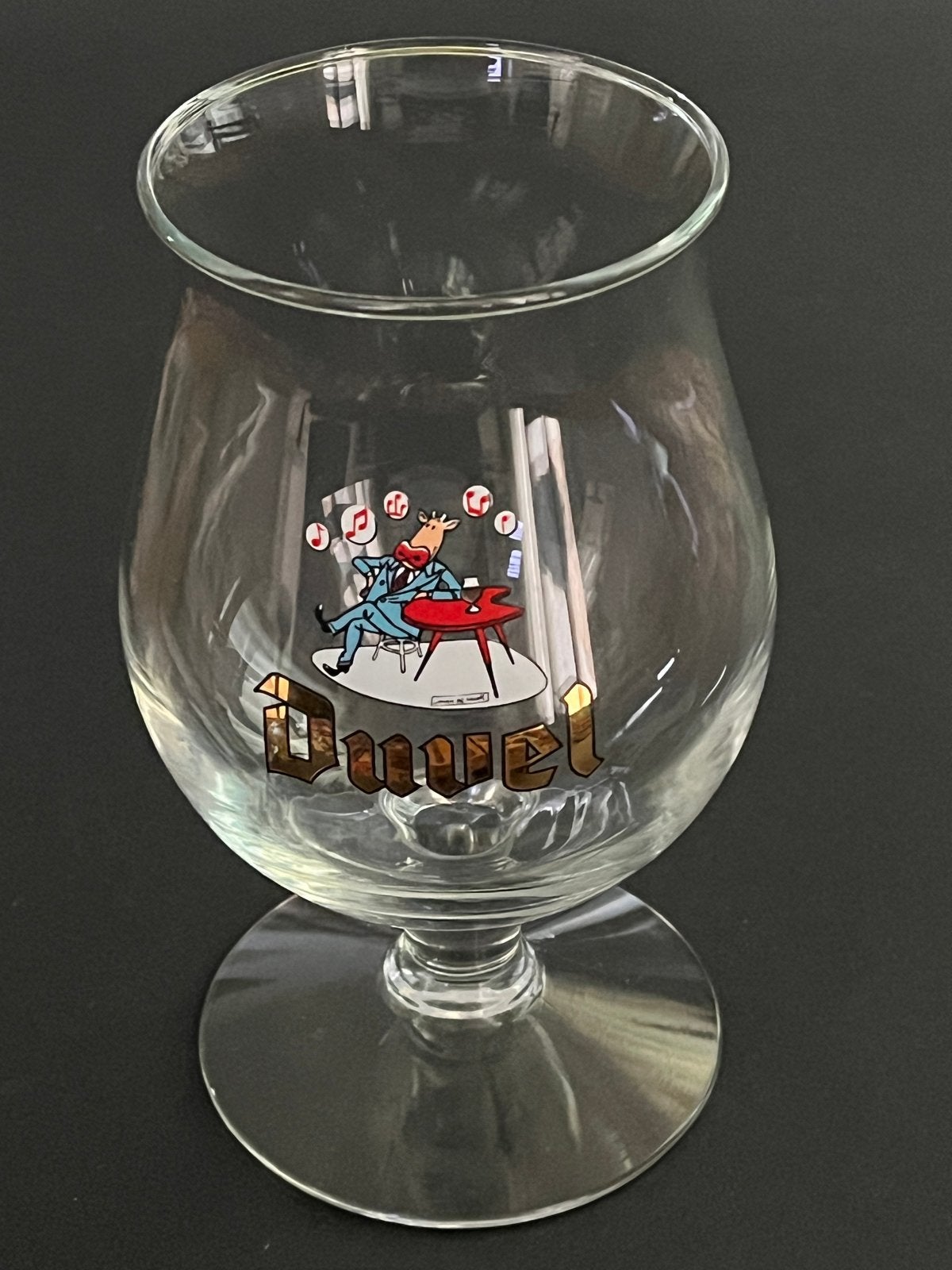 Duvel bierglas uit 2003 met illustratie van Kobe de Koe, Ophalen of Verzenden, Zo goed als nieuw, Glas of Glazen, Duvel