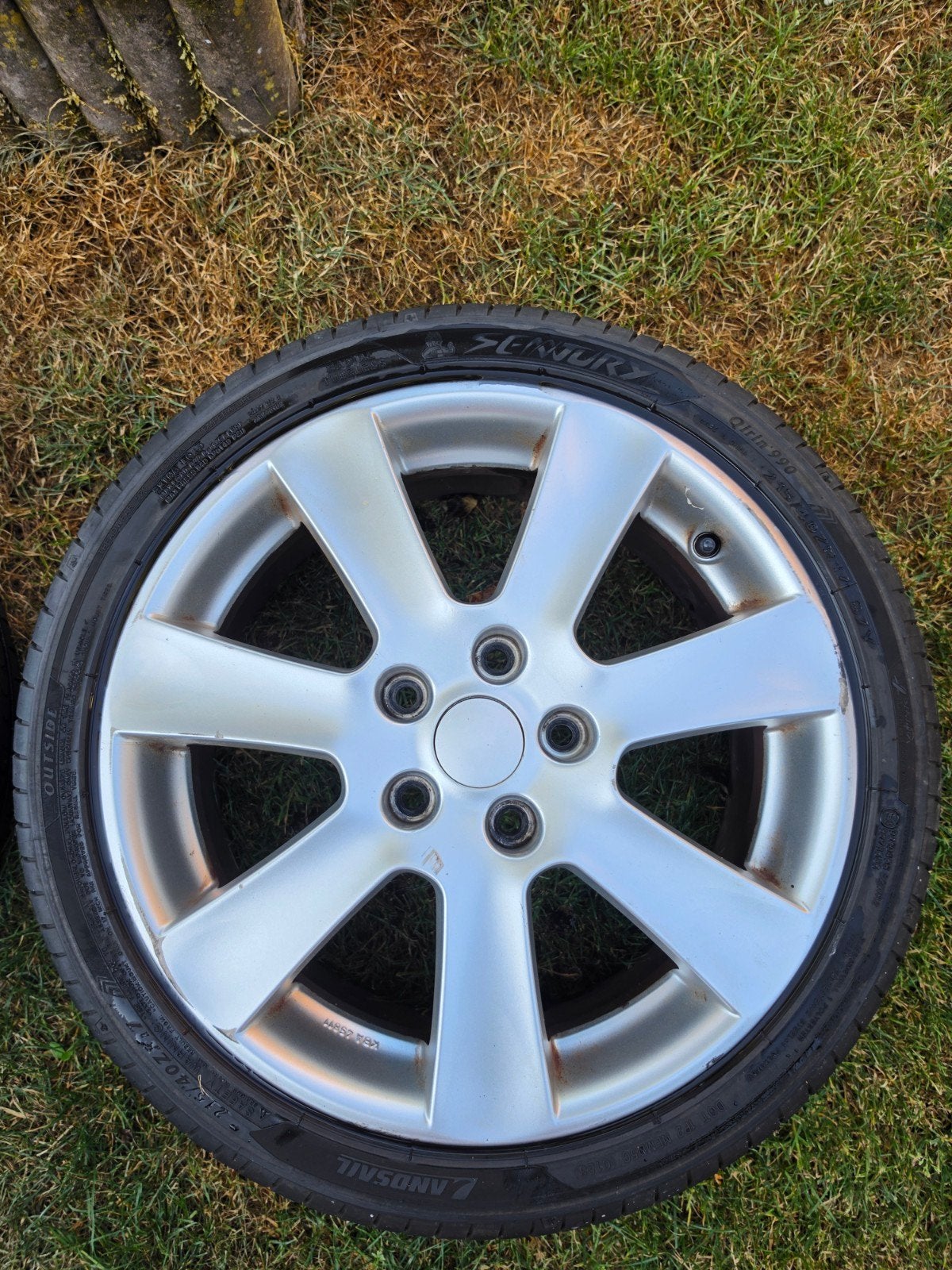 4 Lichtmetalen velgen met banden van een Mitsubishi Lancer, Auto-onderdelen, Banden en Velgen, Ophalen, 215 mm, Banden en Velgen