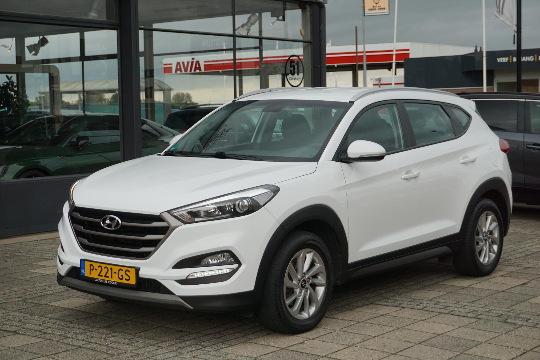 Hyundai Tucson 1.6 T-GDi Comfort 4WD | trekhaak, Auto's, Stof, Gebruikt, 4 cilinders, Wit
