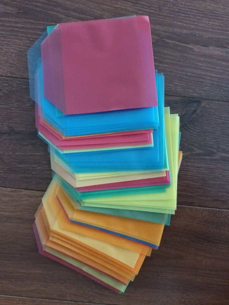 72 plastic CD DVD hoesjes sleeves gekleurd nieuw nieuwe, Ophalen of Verzenden, Nieuw