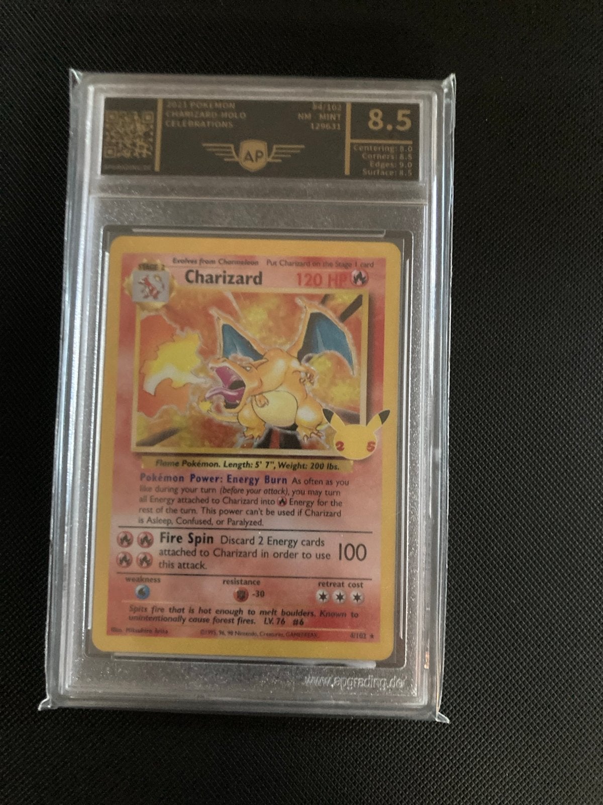 Pokémon Charizard Celebrations 25th Anniversary AP Graded 8., Ophalen of Verzenden, Zo goed als nieuw, Losse kaart