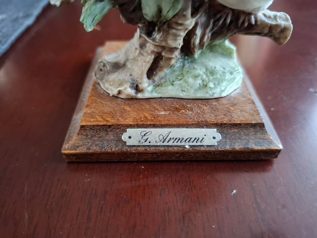G. Armani beeldje met duiven, Ophalen