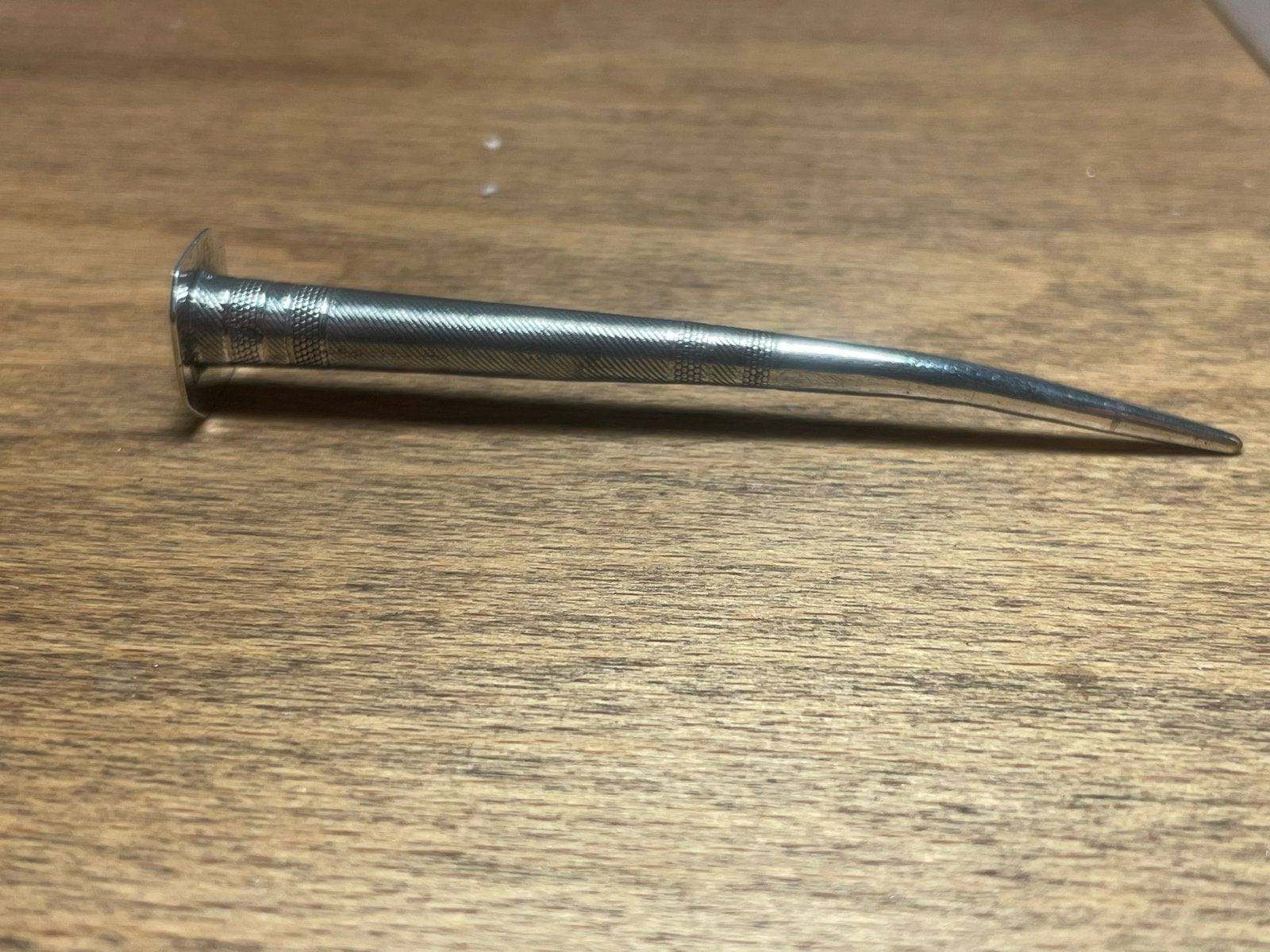 Zilveren pijpenkrabber/wroeter met keuren, Ophalen, Zilver