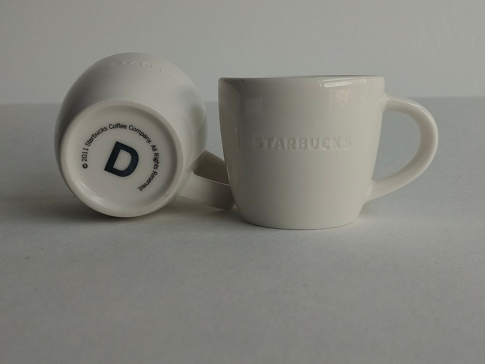 Set van 2 Starbucks espresso kopjes - wit, Ophalen of Verzenden, Zo goed als nieuw, Overige stijlen, Kop(pen) en/of Schotel(s)
