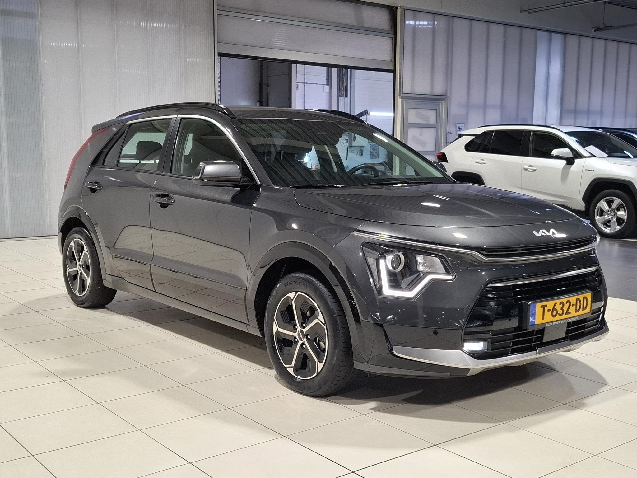 Kia Niro 1.6 GDi Hybrid DynamicLine Trekhaak, Apple Carplay/, Auto's, 1374 kg, Gebruikt, Euro 6, Leder en Stof