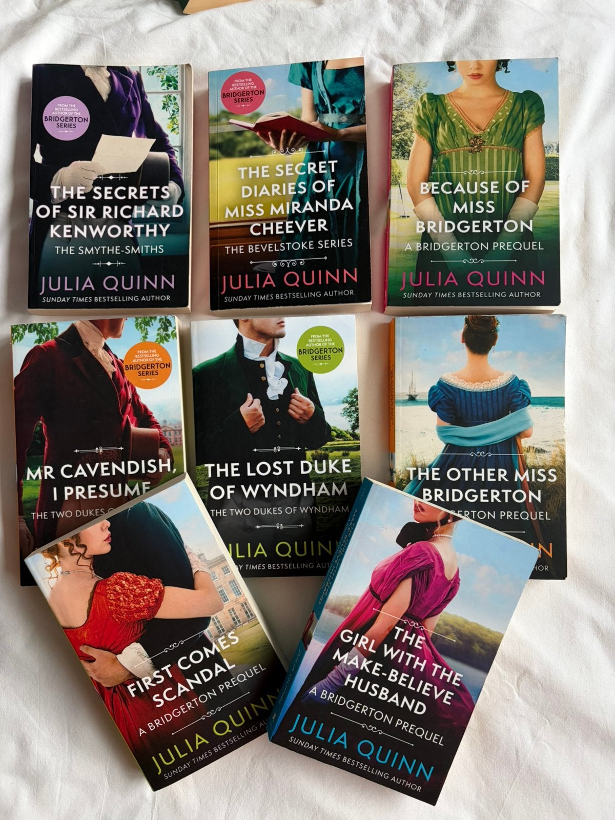 8 boeken van Julia Quinn (Bridgerton prequel, Wyndham etc), Ophalen of Verzenden, Zo goed als nieuw