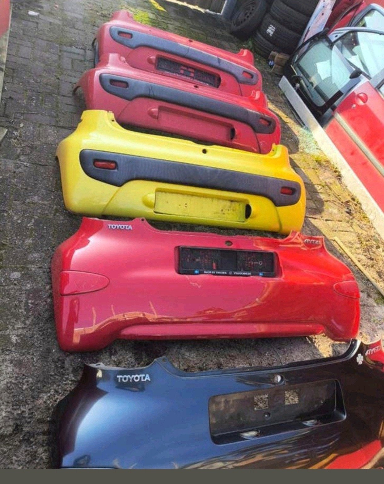 Partij 9x achterbumpers rood wit ect Aygo C1 107 2006 -2022, Auto-onderdelen, Voor, Nieuw, Ophalen of Verzenden, Spatbord