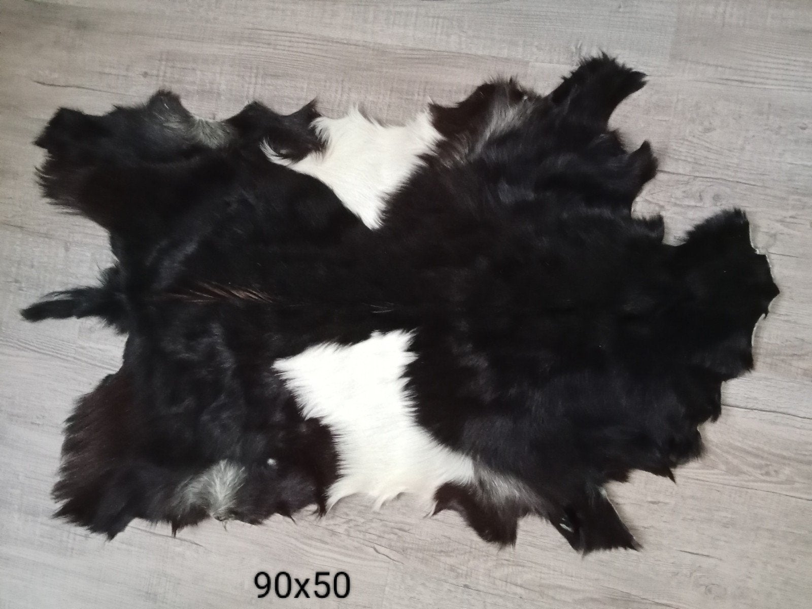 Prachtig zwart-wit geitenvel vloerkleed, Huis en Inrichting, Minder dan 50 cm, Gebruikt, 50 tot 100 cm, Ophalen of Verzenden