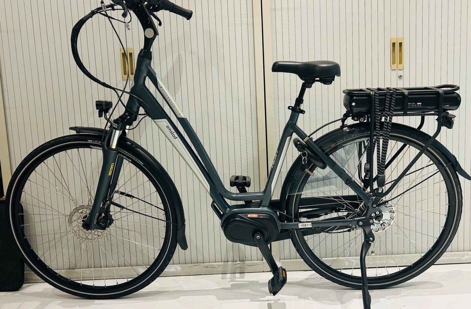 Amslod elektrische fiets, middenmotor als nieuw, met storing, Zo goed als nieuw, 51 tot 55 cm, 50 km per accu of meer, Ophalen