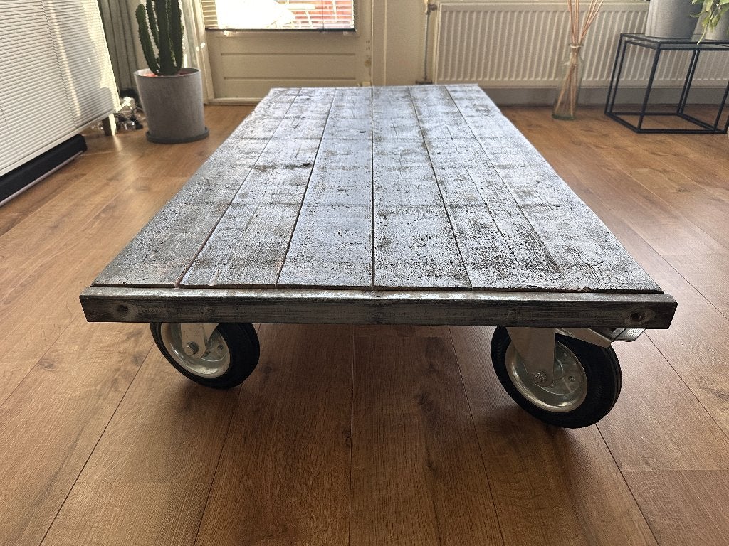 Industriële salontafel (steenschot) met wielen, Huis en Inrichting, Tafels | Salontafels, Ophalen, Gebruikt, 100 tot 150 cm, 50 tot 100 cm