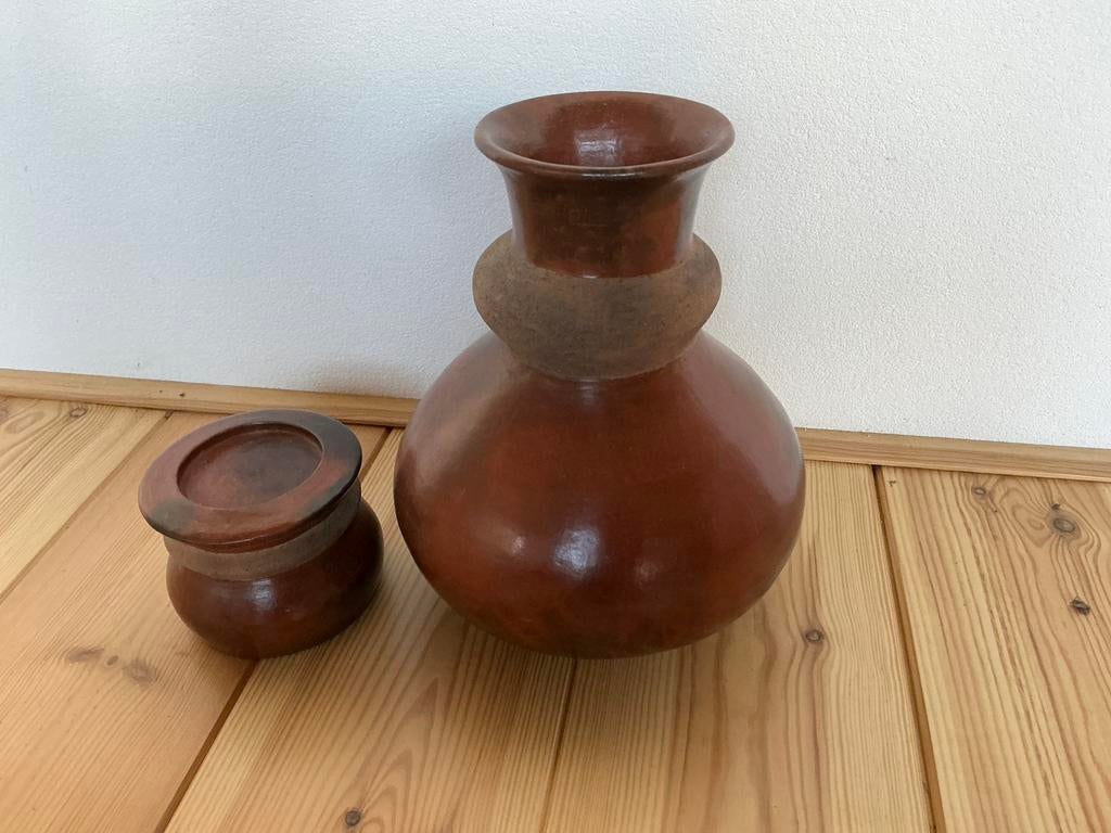 Indonesische vaas en kandelaar, Ophalen