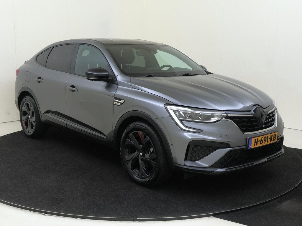 Renault Arkana 1.6 E-Tech Hybrid 145 R.S. Line Leder | Clima, Auto's, Arkana, Gebruikt, 760 kg, Hybride Elektrisch/Benzine