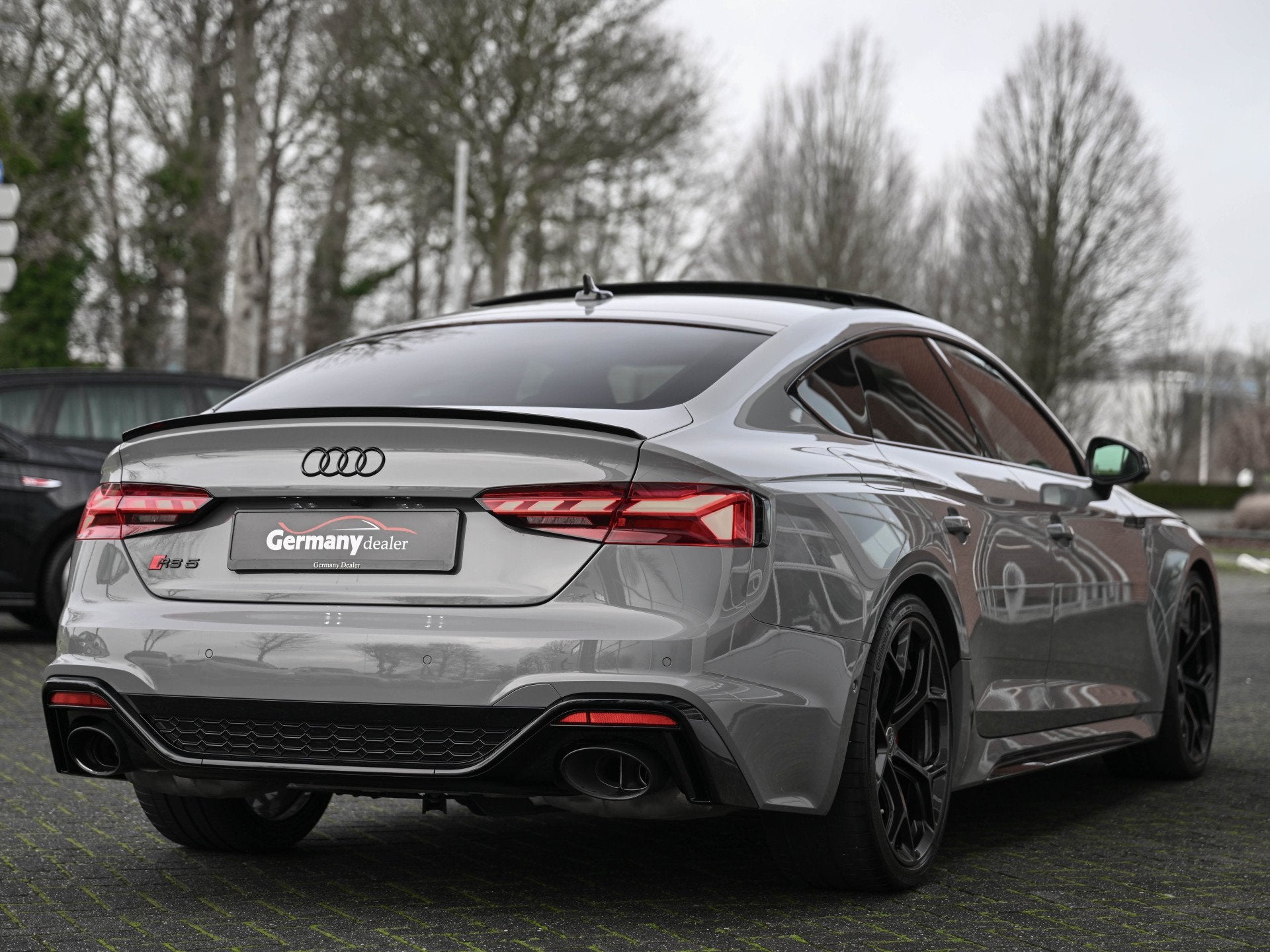 Audi RS5 Sportback 2.9TFSI Quattro Competition Plus Schaalst, Auto's, Audi, Gebruikt, Zwart, Met garantie (alle), 451 pk