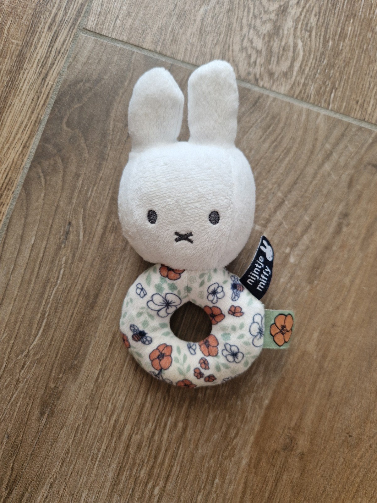 Nijntje Miffy rammelaar met bloemenprint, Ophalen of Verzenden, Zo goed als nieuw, Rammelaar, Met geluid