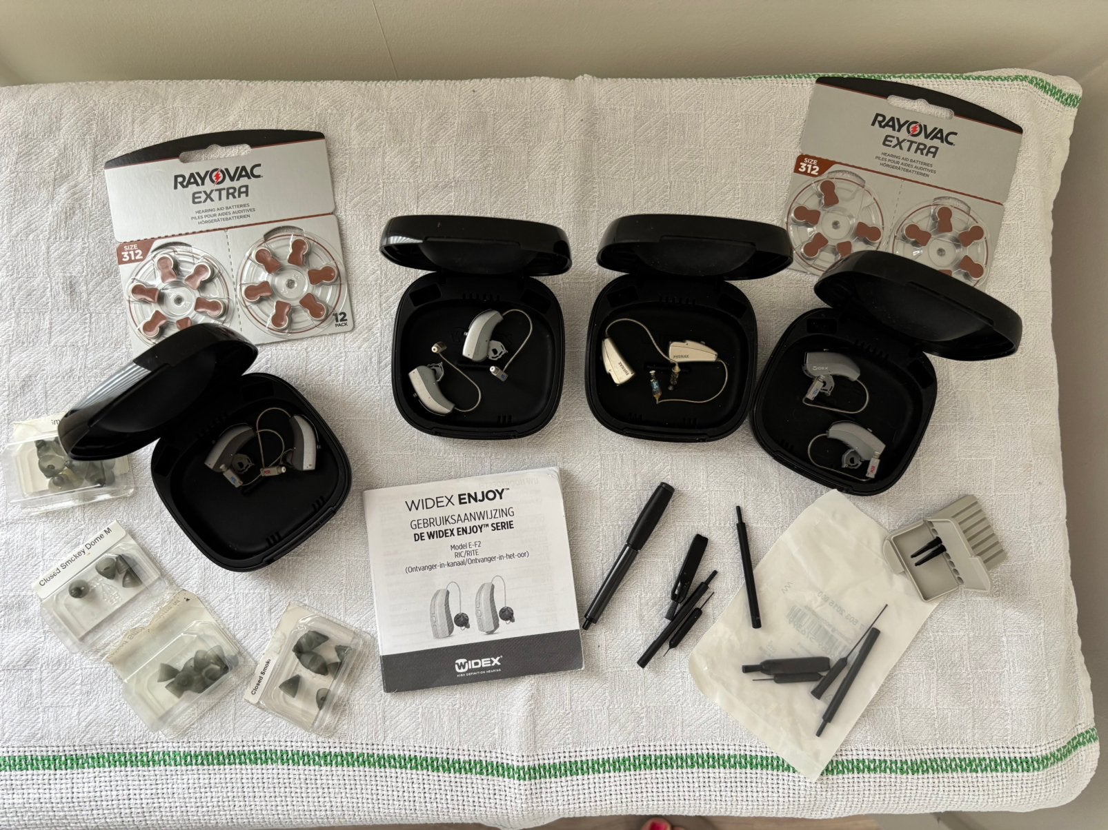 4 sets hoortoestellen (Widex Enjoy & Phonak) + accessoires, Ophalen of Verzenden, Gebruikt