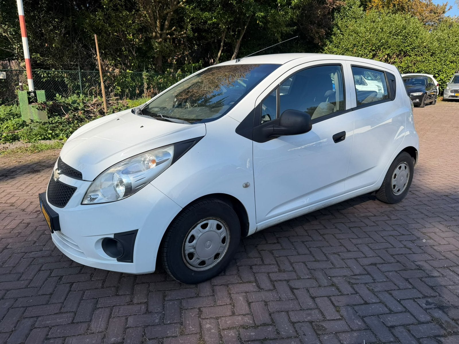 Chevrolet Spark 1.0 Bifuel 2012 Wit/New Apk, Auto's, Euro 5, 15 km/l, 37 €/maand, 4 cilinders