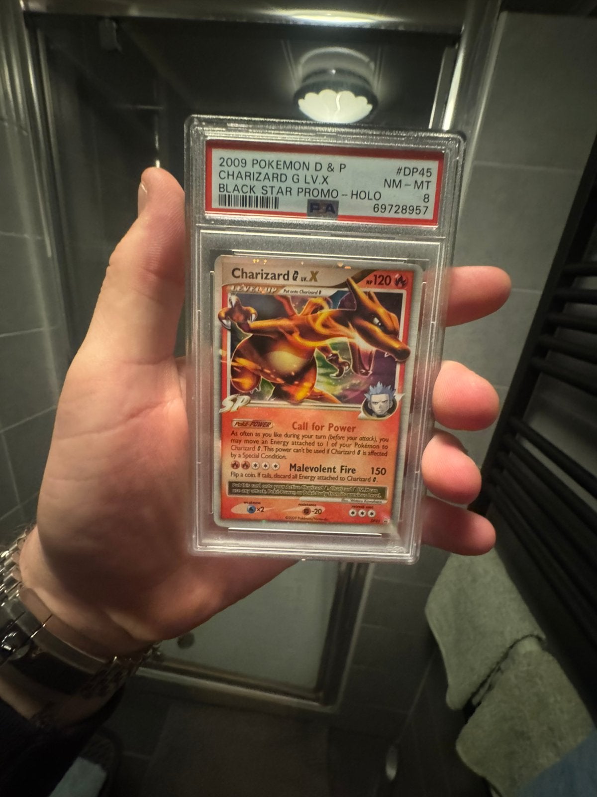 Charizard DP45 PSA 8, Ophalen of Verzenden, Zo goed als nieuw