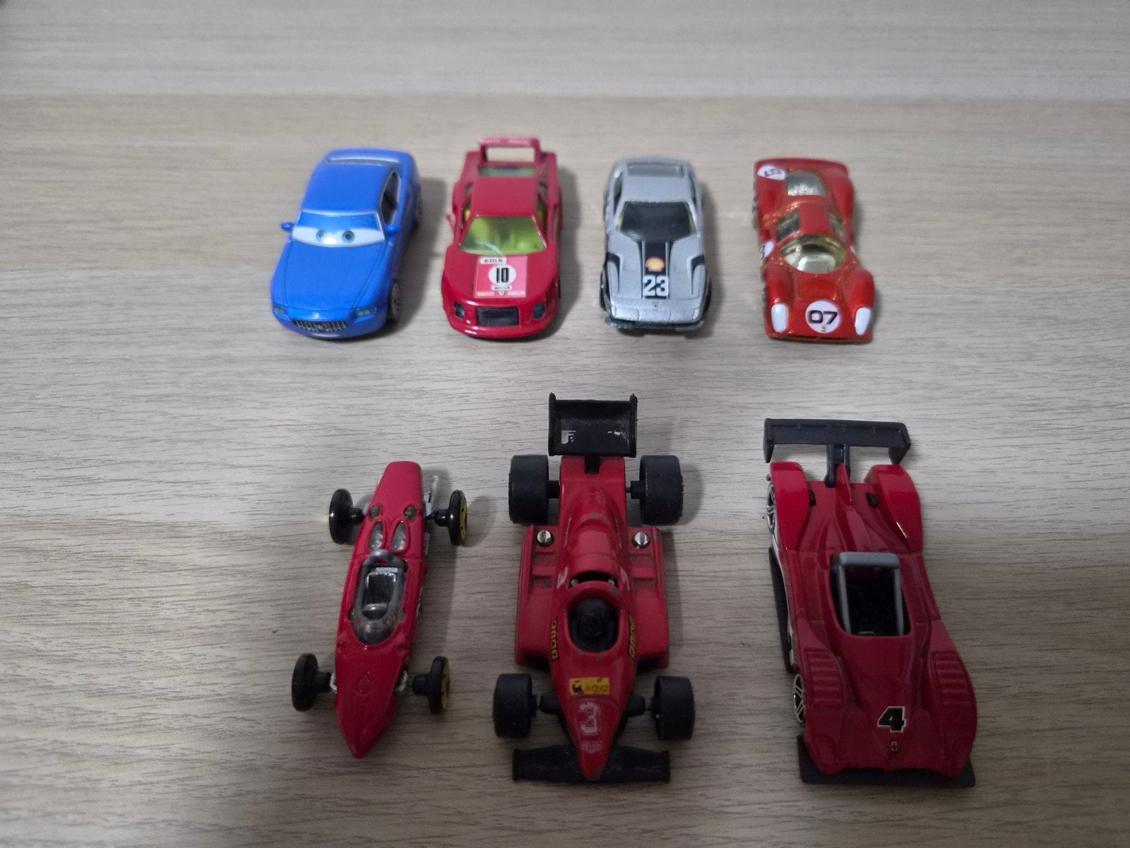 Collectie van 7 diverse modelauto's en raceauto's, Hobby en Vrije tijd, Overige merken, Gebruikt, 1:50 of kleiner, Auto