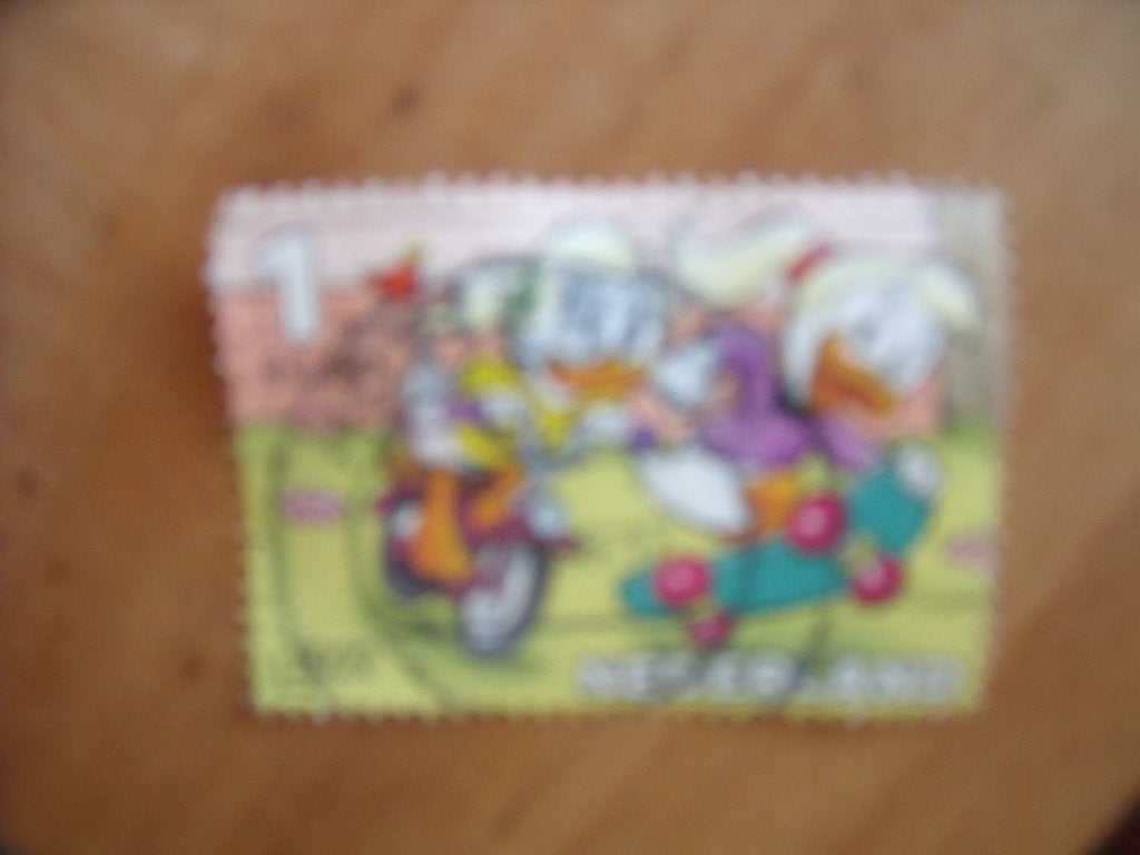 Postzegel uit Donald Duck serie gestempeld in prima staat, Postzegels en Munten, Ophalen of Verzenden, Na 1940, Gestempeld