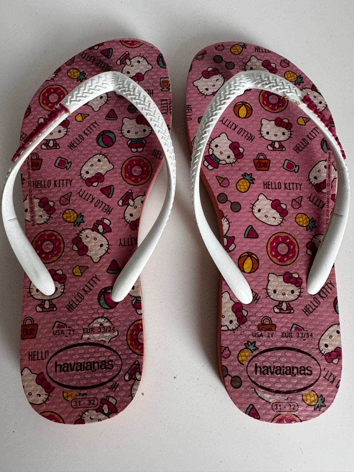 Havaianas Hello Kitty slippers maat 33-34, Ophalen of Verzenden, Gedragen, Roze, Slippers