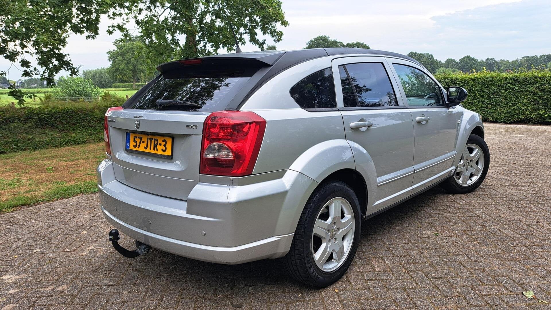 Dodge Caliber 2.0 SXT AUT. CRUISE ELEK.RAMEN AIRCO HOGE ZIT, Auto's, 1998 cc, 450 kg, Gebruikt, Zwart