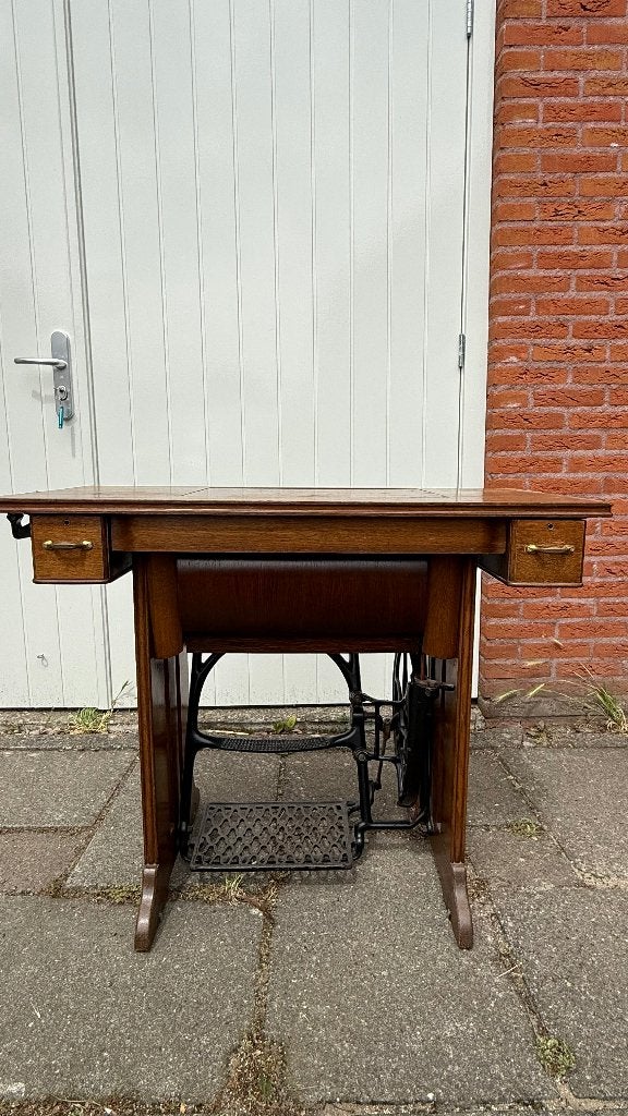Singer trapnaaimachine, Ophalen