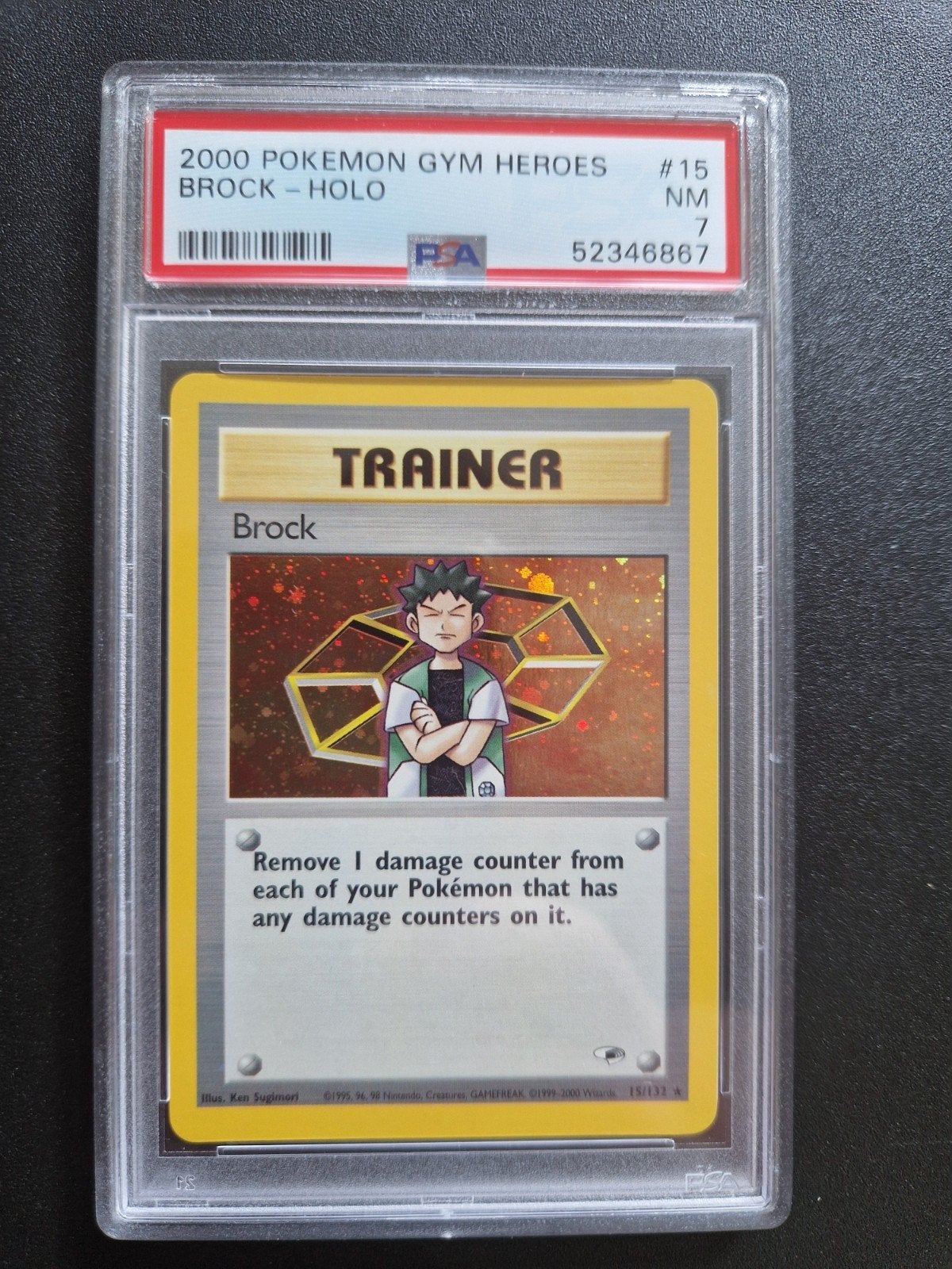 Pokemon Brock Trainer PSA 7 Gym Heroes Holo #15, Ophalen of Verzenden, Gebruikt, Losse kaart, Foil
