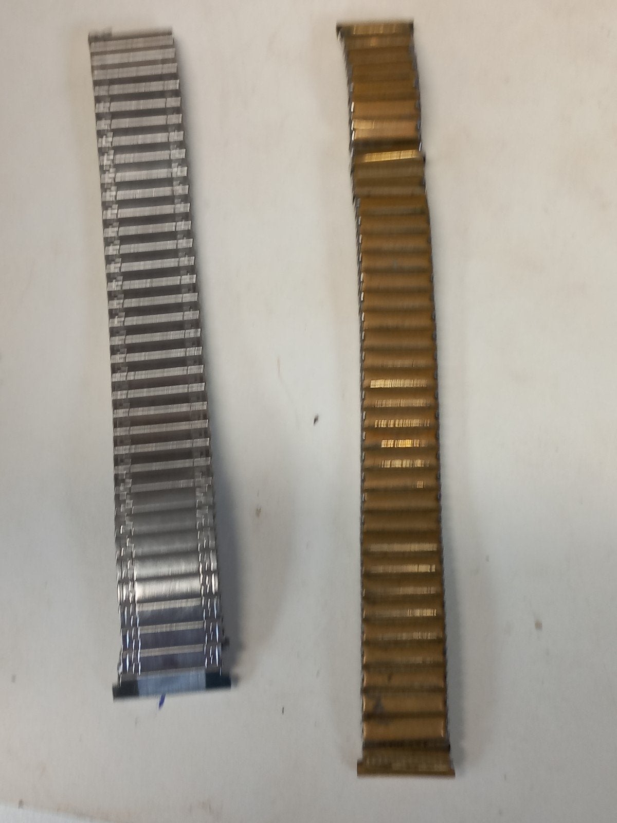 Twee Fixoflex horlogebandjes, zilverkleurig en goudkleurig, Ophalen of Verzenden, Gebruikt, Staal, Overige merken