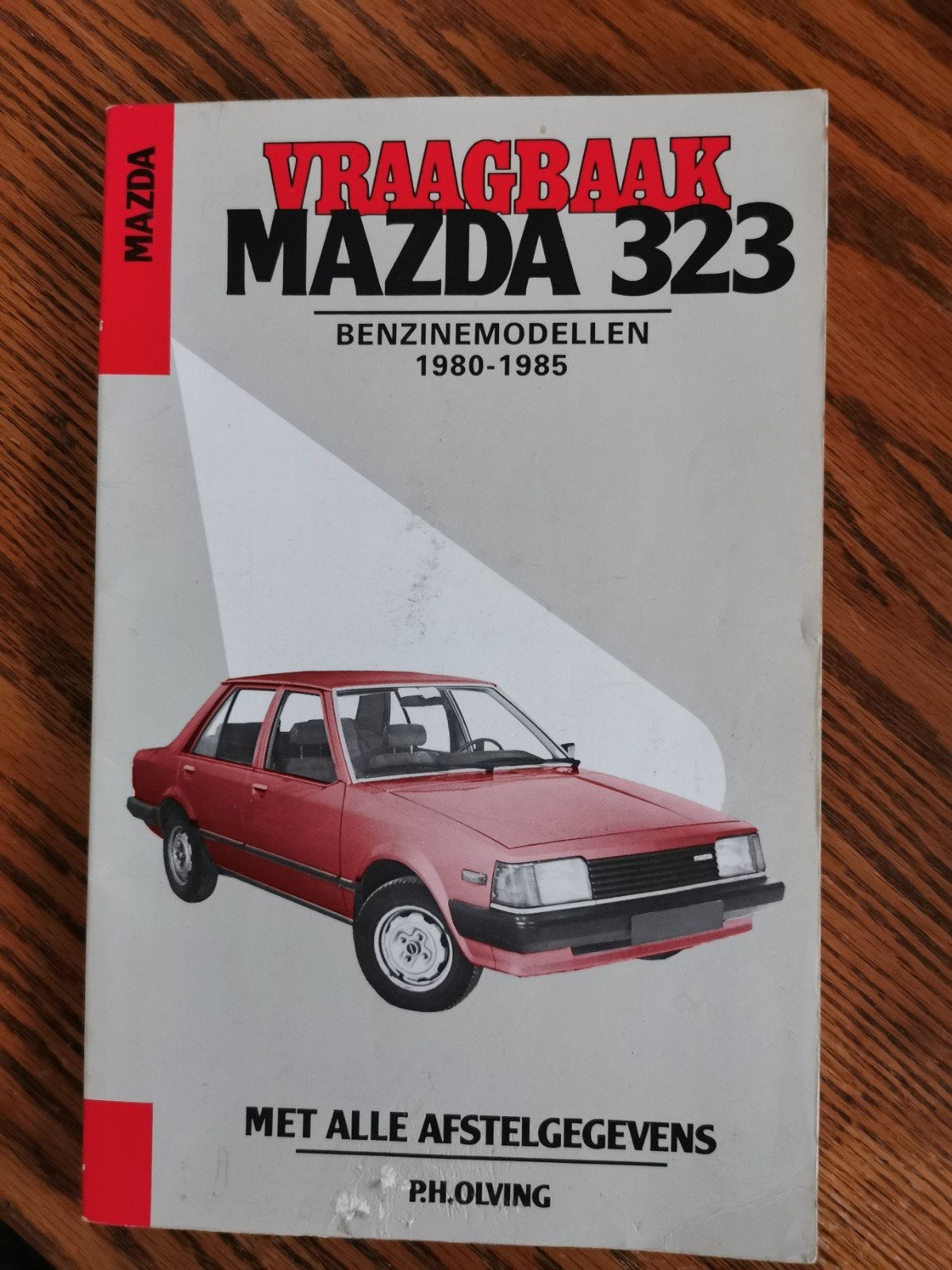 Vraagbaak Mazda 323 Benzine 1980-1985 - P.H. Olving, Boeken, Auto's | Boeken, Ophalen of Verzenden, Gelezen, Mazda, P.H. Olving