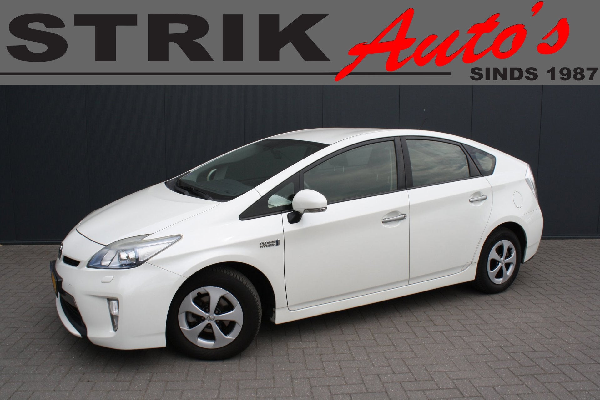Toyota Prius 1.8 Plug-in Dynamic Business - NAVIGATIE - CAME, Auto's, Euro 5, Gebruikt, Zwart, Wit