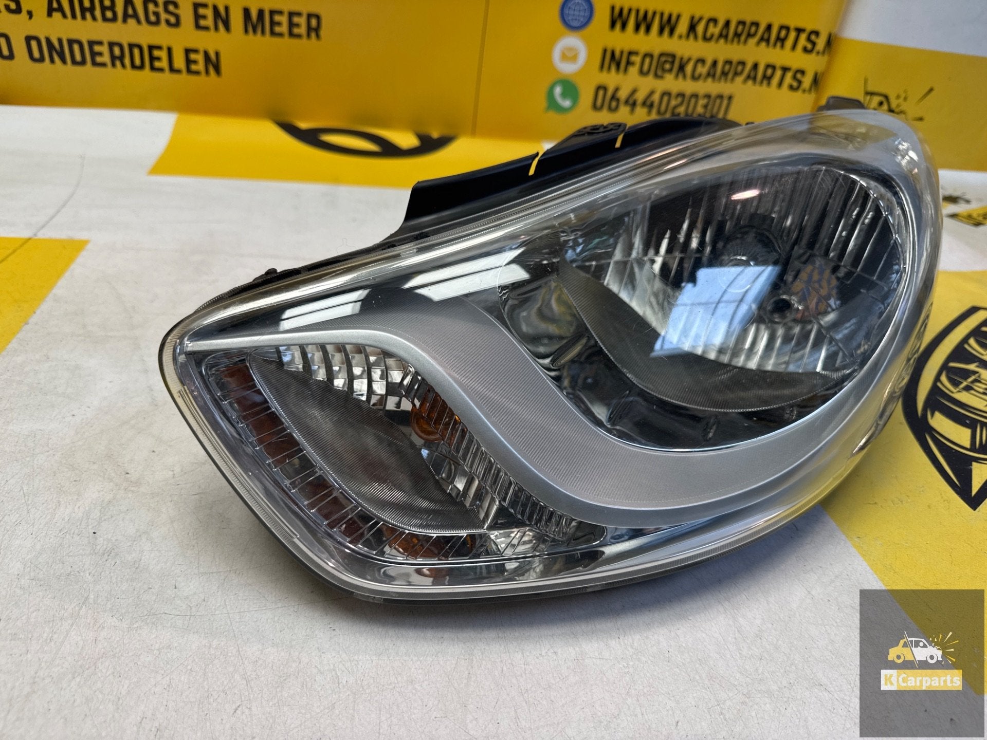 Hyundai i10 links voor koplamp origineel LHD13002 koplamp, Info@fabrikant.eu, Fabrikantstraat 1
1000 AA  Amsterdam, NL, Ophalen of Verzenden