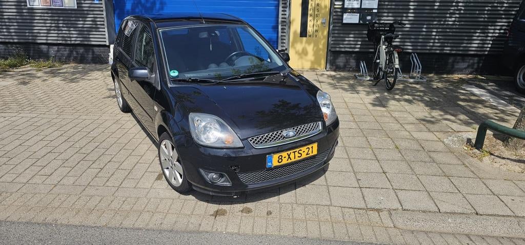Ford Fiësta 1.4 16V 5DR 2007 Zwart, Auto's, 40 €/maand, Zwart, 4 cilinders, Zwart