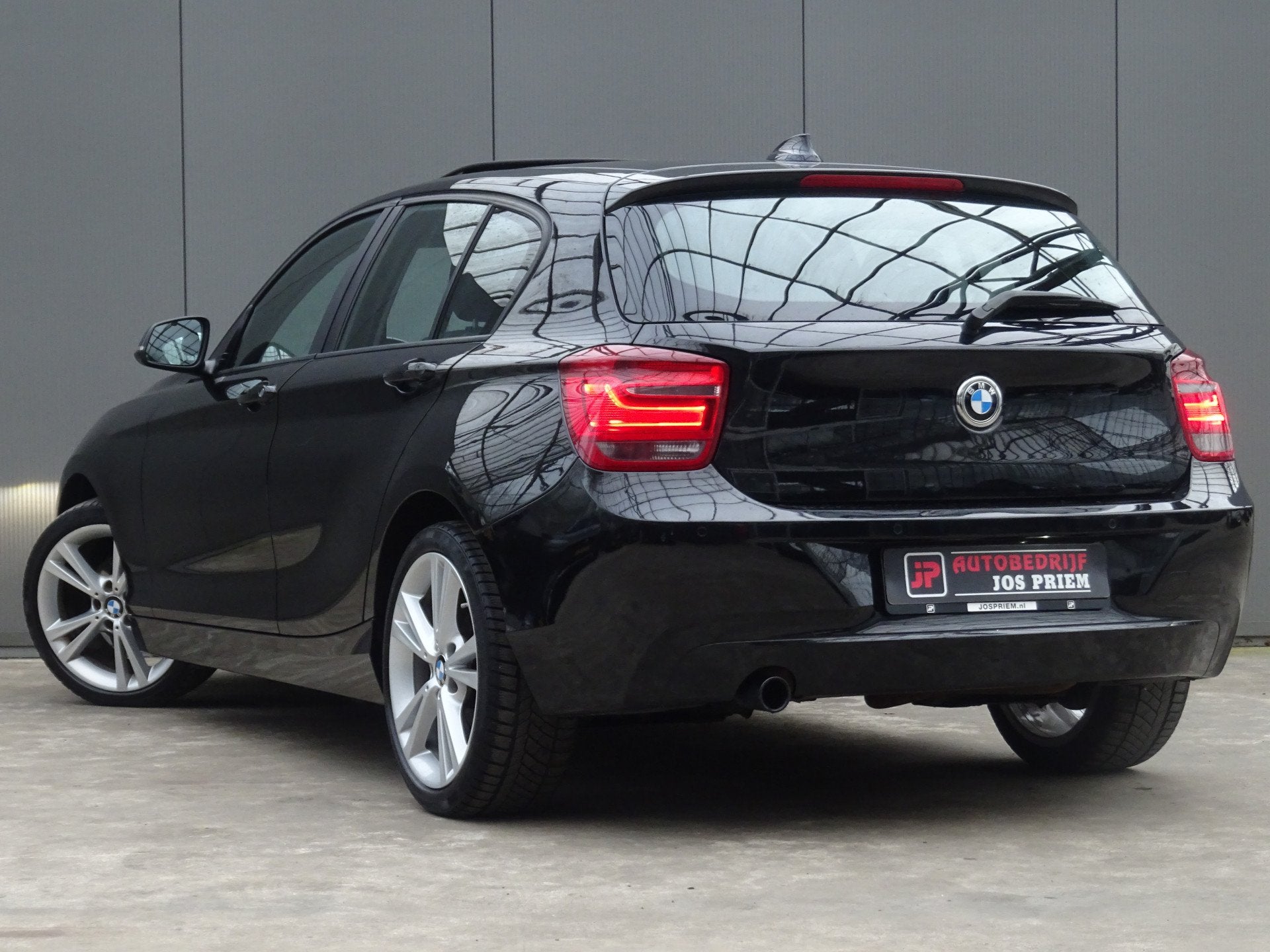 BMW 1-serie 116i Limited Edition * OPEN DAK * PDC * GR NAVIG, Auto's, Euro 5, Gebruikt, 4 cilinders, Zwart