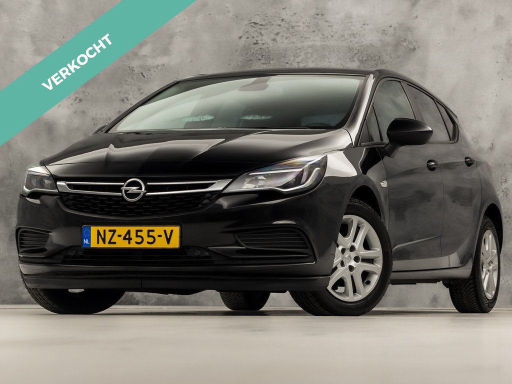 Opel Astra 1.0 Sport Automaat (APPLE CARPLAY, GROOT NAVI, CA, Auto's, Opel, 12 maanden, Stof, Gebruikt, 610 kg