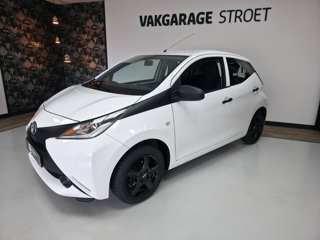 Toyota Aygo 1.0 VVT-i x-fun | cruise | ac | voll deal oh + b, Auto's, Toyota, Stof, Gebruikt, 4 stoelen, Wit