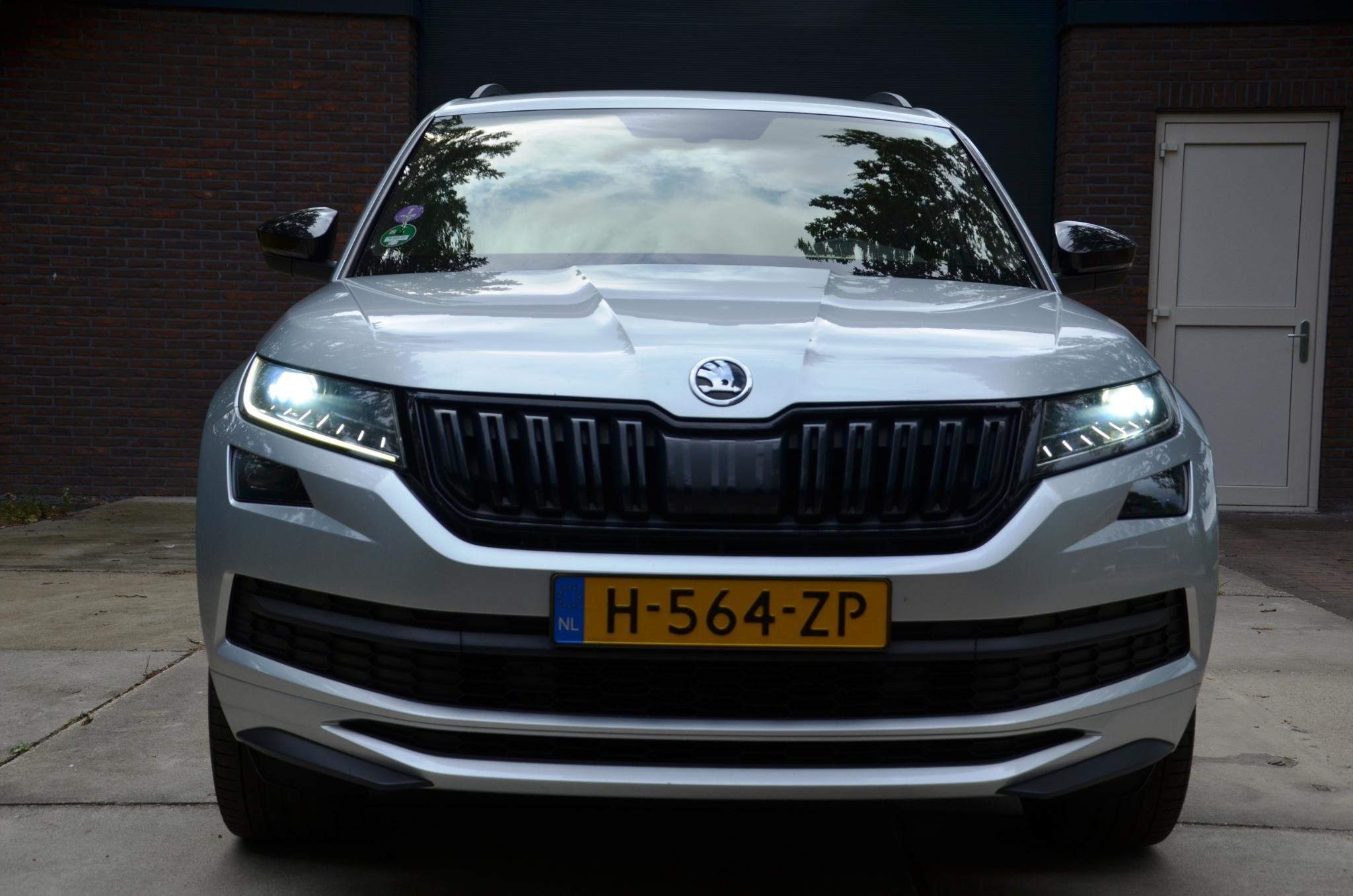 Skoda Kodiaq 1.5 TSI Sportline Business Automaat/Navi/Led/Ec, Auto's, 4 cilinders, 150 pk, Automatische klimaatregeling, Origineel Nederlands