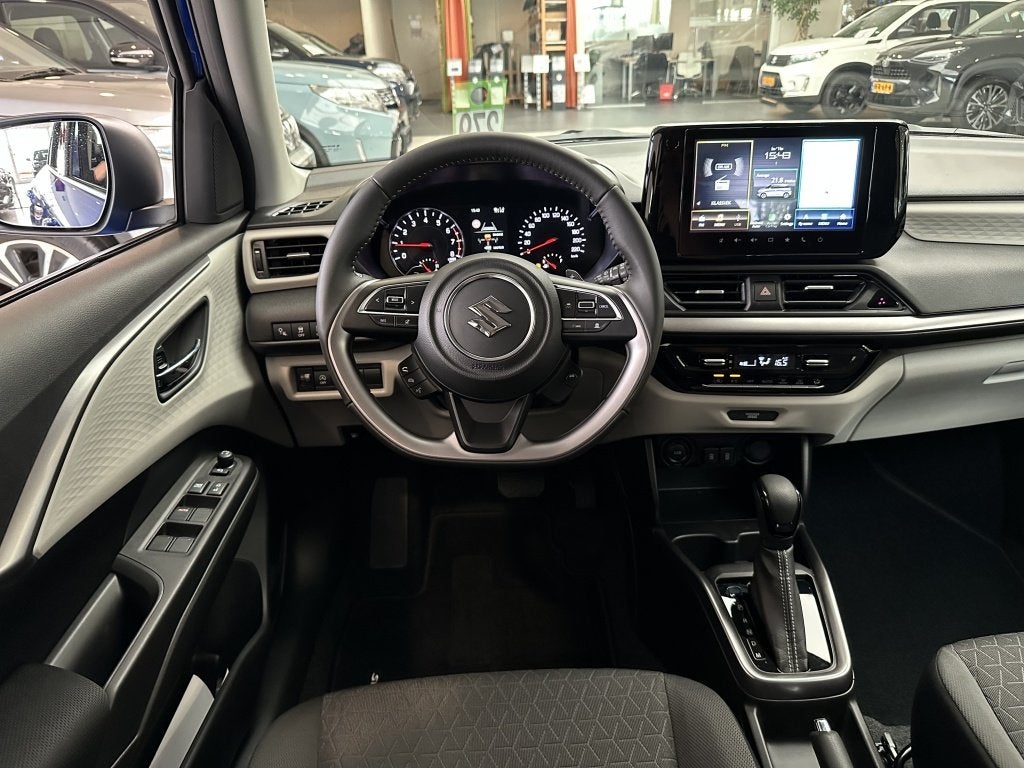 Suzuki Swift 1.2 Style SmartHyb. [ CLIMATE I ADAPTIEVE CRUIS, Auto's, Suzuki, 12 maanden, Stof, Gebruikt, Zwart