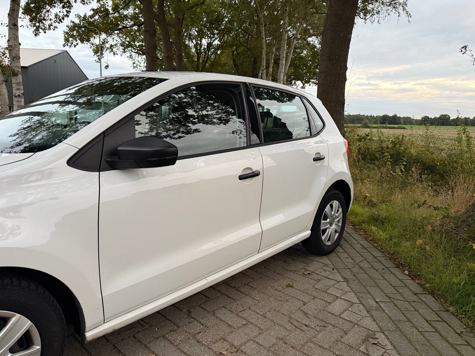 Volkswagen Polo 1.2 2011 5 DRS Stoelverwarming/Carplay, Auto's, Voorwielaandrijving, Zwart, 1199 cc, Wit
