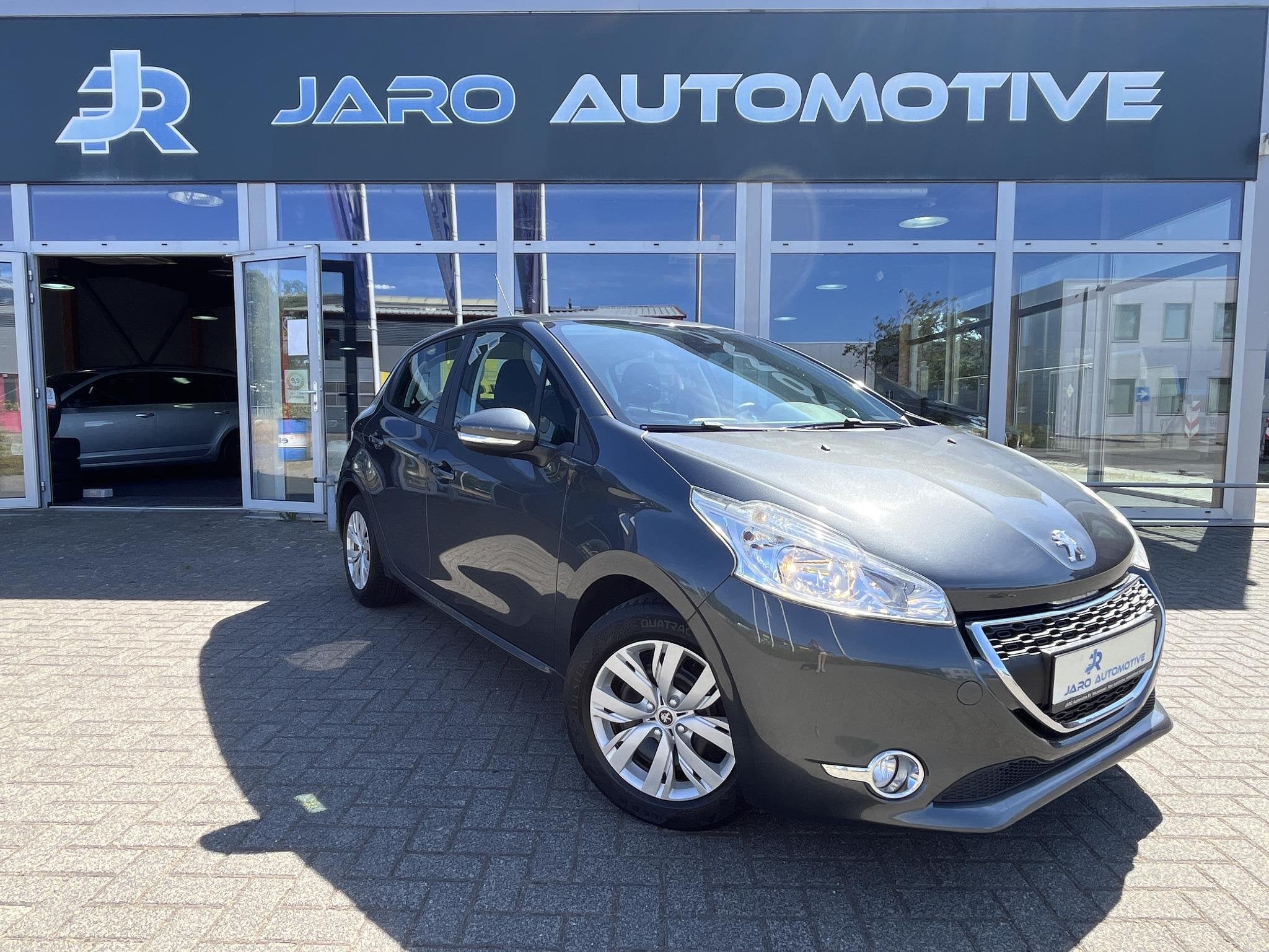 Peugeot 208 1.2 VTi Envy | Cruise Control | PDC achter | Nav, Euro 5, Stof, Gebruikt, 31 €/maand