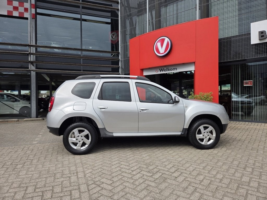 Dacia Duster 1.6 16V Aniversare Airco | Trekhaak | Nw Distri, Auto's, Gebruikt, Zwart, 4 cilinders, 49 €/maand