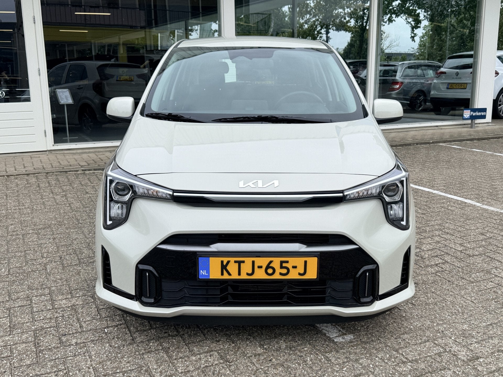 Kia Picanto 1.0 DPI DynamicLine | Stoel- en stuurverwarming, Auto's, Dealer onderhouden, Euro 6, 4 stoelen, Leder en Stof