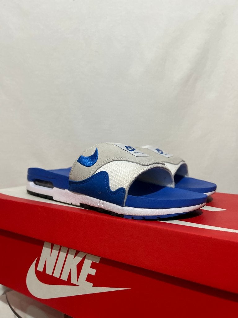ALS NIEUW! Maat 42,5 - Nike Air Max 1 Slide Royal Blue, Slippers, Nike, Zo goed als nieuw, Nike