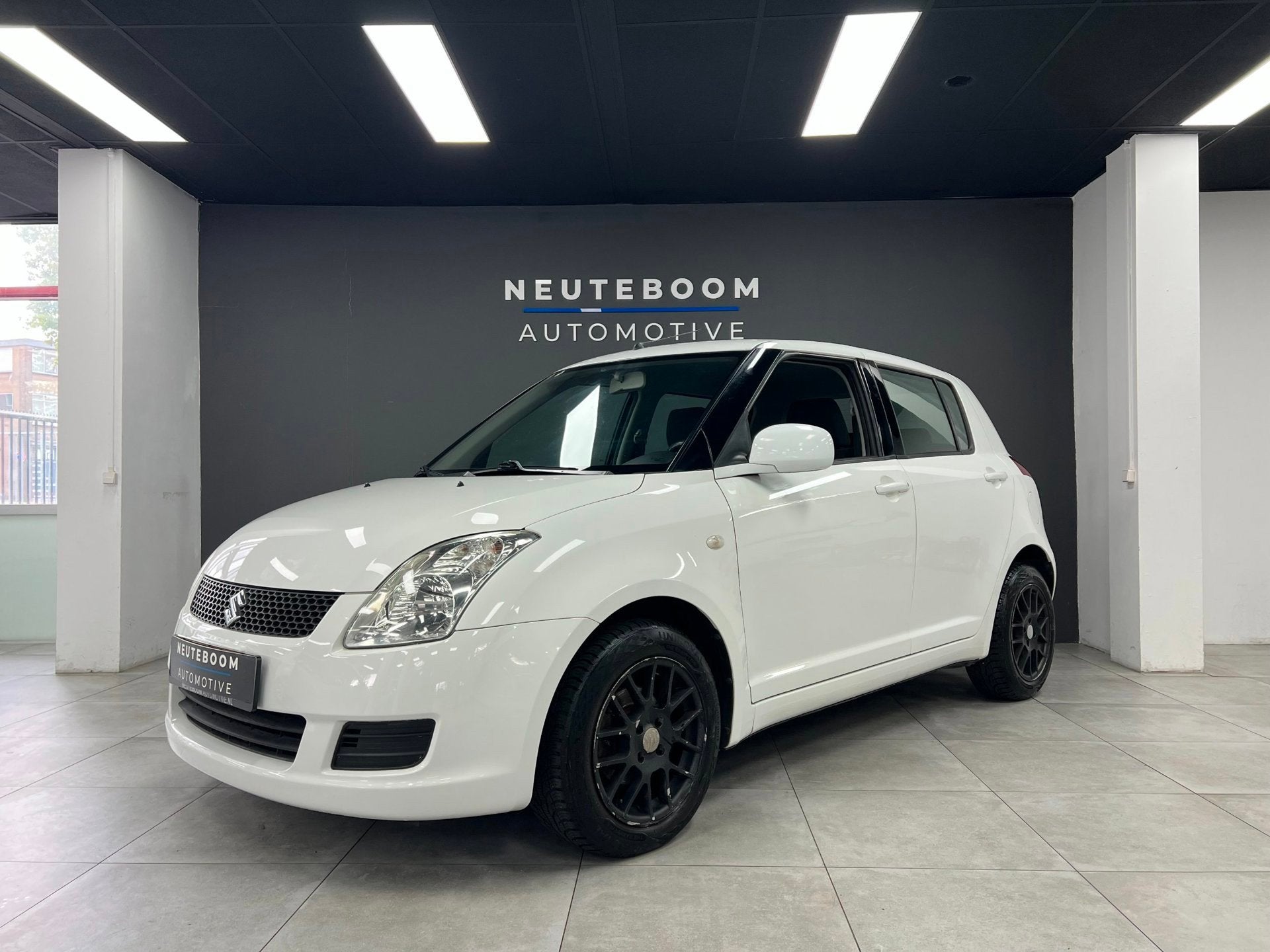 Suzuki Swift 1.3 Base | Airco | Elekt.ramen, Auto's, Voorwielaandrijving, Stof, Zwart, 400 kg